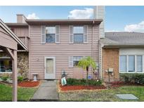 Inviting two-story condo with landscaped front yard at 5328 Ridgewell Ct, Tampa, FL 33624
