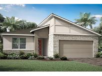 Modern one-story home with stone accents and a two-car garage at 11830 Starbright Path, Venice, FL 34293