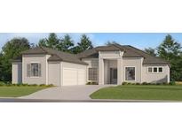 Two-story house with a three-car garage and landscaped lawn at 18710 Cherrystone Way, Lakewood Ranch, FL 34211