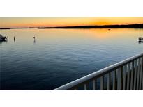 Stunning sunset over calm water, seen from private balcony at 8800 Bay Pines Blvd # 220, St Petersburg, FL 33709