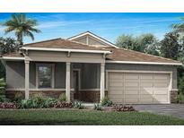 One-story home with gray siding, brown roof, and a two-car garage at 11822 Starbright Path, Venice, FL 34293