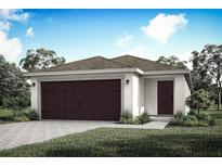 Single-story home with a two-car garage and landscaped front yard at 4066 Irish Ter, North Port, FL 34288