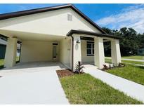 Craftsman style home with covered front porch and walkway at 5701 N 20Th St, Tampa, FL 33610