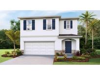 Two-story house with white siding, blue accents, and a two-car garage at 10559 Dusty Boot Rd, Land O Lakes, FL 34638