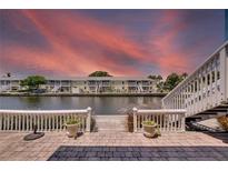 Waterfront view of canal and building at sunset at 5005 Coquina Key Se Dr # B, St Petersburg, FL 33705