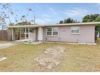 Ranch style home with carport and small front yard at 10591 116Th Ter, Largo, FL 33773