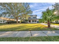 Two-story house with a landscaped yard and driveway at 3870 155Th E Ave, Parrish, FL 34219