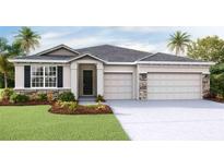 Beautiful one-story home with a two-car garage and nicely landscaped lawn at 4327 Pullet Ct, Lakewood Ranch, FL 34211