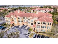Aerial view of upscale community with pool, offering resort-style living at 2724 Via Murano # 631, Clearwater, FL 33764