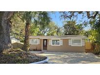 Updated bungalow with a freshly paved driveway and landscaping at 301 3Rd Sw Ave, Largo, FL 33770