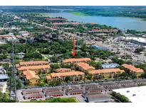 Aerial view of condo community near water at 10764 70Th Ave # 1303, Seminole, FL 33772