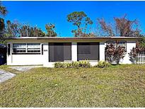 Charming ranch home with well-maintained lawn and mature trees at 5641 94Th N Ter, Pinellas Park, FL 33782