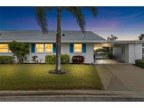 Inviting exterior of a single-story home with well-manicured lawn at 4519 Lexington Cir # 4519, Bradenton, FL 34210