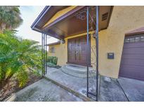 Inviting house entrance with double doors and decorative metal accents at 816 Knight St, Seffner, FL 33584