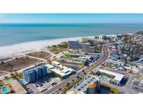 Aerial view showing the property's location near the beach and other buildings at 11730 Gulf Blvd # 49, St Petersburg, FL 33706