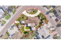 Aerial view of a single-Gathering home with a pool and large backyard at 911 Boca Ciega Isle Dr, St Pete Beach, FL 33706