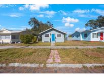 Cute bungalow style home with blue door at 4135 4Th N Ave, St Petersburg, FL 33713