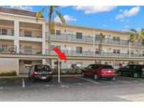 Covered parking area with assigned parking spot for condo residents at 845 Maple Ct # 107, Dunedin, FL 34698
