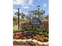 Seapointe community entrance with beautiful landscaping at 7520 Sunshine Skyway S Ln # T18, St Petersburg, FL 33711