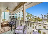 Relax on this balcony overlooking the beach and ocean at 2406 Gulf Blvd # 204, Indian Rocks Beach, FL 33785