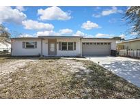 Charming ranch home with a one car garage at 9608 Richwood Ln, Port Richey, FL 34668