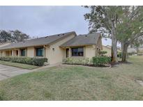Attractive exterior of a single-story home with well-manicured landscaping at 2579 Bay Berry Dr # 42D, Clearwater, FL 33763