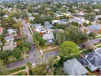 Aerial view of a charming house nestled in a tree-lined neighborhood at 505 15Th Ne Ave, St Petersburg, FL 33704