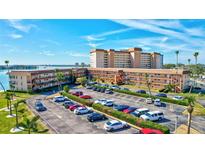 Beautiful waterfront condo complex boasting ample parking and lush landscaping at 5020 Brittany S Dr # 123, St Petersburg, FL 33715