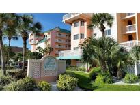 The Beach Cottage: inviting exterior, lush landscaping, and convenient parking at 18400 Gulf Blvd # 1505, Indian Shores, FL 33785