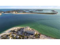 Panoramic aerial view of beachfront condos with stunning ocean views and white sand beaches at 200 1St Ave # 312, St Pete Beach, FL 33706