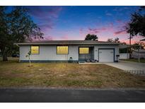 Charming single-story home with a well-manicured lawn and attached garage at 3700 12Th N St, St Petersburg, FL 33704