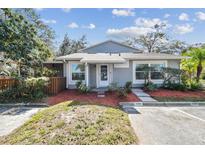 Charming condo with landscaped front and private covered entrance at 15107 Morning Dr, Lutz, FL 33559