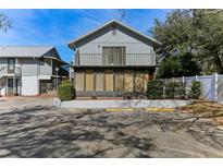 Building exterior with parking and partial view of neighboring building at 1960 Union St # 42, Clearwater, FL 33763