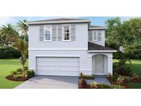 Two-story house with gray siding, gray shutters, and a two-car garage at 36101 Sunflower Hill Dr, Zephyrhills, FL 33541