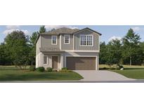 Two-story home with brown garage door and gray siding at 9404 Runaway Breeze Dr, Land O Lakes, FL 34637