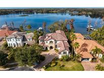 Luxury waterfront home with private drive and stunning lake views at 1903 Haven Bend, Tampa, FL 33613
