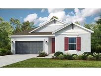 One-story home with gray siding, red shutters, and a two-car garage at 1988 Longliner Loop, Wesley Chapel, FL 33543