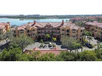 Condo building exterior showcasing Spanish-style architecture at 2765 Via Cipriani # 1232B, Clearwater, FL 33764