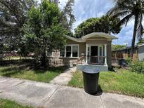 Charming bungalow-style home with a front porch at 1311 11Th S Ave, St Petersburg, FL 33705