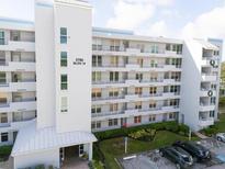 Condo building with parking and landscaping at 3780 Pinebrook Cir # 106, Bradenton, FL 34209