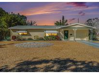 Charming ranch home with a well-manicured lawn and updated facade at 3992 60Th N St, St Petersburg, FL 33709