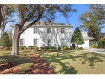 Beautiful two-story home with lush landscaping and a spacious driveway at 4811 Culbreath Isles Rd, Tampa, FL 33629