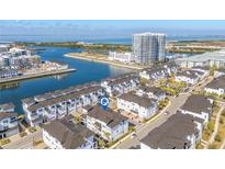 Stunning aerial view of waterfront homes and community amenities at 5351 Bridge St # 67, Tampa, FL 33611