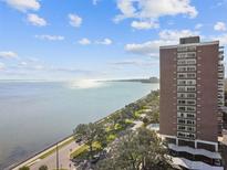 High-rise building with water views and a pool at 4015 Bayshore Blvd # 9D, Tampa, FL 33611