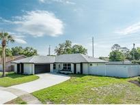 Newly renovated home with modern exterior and driveway at 734 Fortuna Dr, Brandon, FL 33511