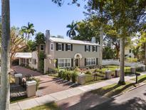Charming two-story home with landscaped yard and brick driveway at 319 26Th W St, Bradenton, FL 34205
