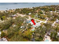 Aerial view showing home's location, neighborhood, and proximity to the water at 1061 Sedeeva St, Clearwater, FL 33755