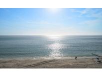Stunning ocean view from the beach with a clear blue sky at 15462 Gulf Blvd # 603, Madeira Beach, FL 33708