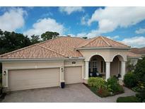 Attractive single-story home with tile roof and two-car garage at 5571 Rock Dove Dr, Sarasota, FL 34241