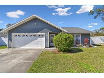 Charming single-story home with a well-maintained lawn and a two car garage in a quiet neighborhood at 9942 56Th Way, Pinellas Park, FL 33782